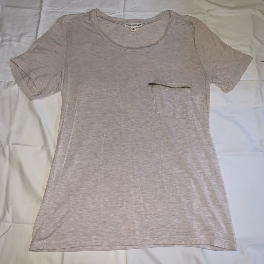 Light pink tee with pocket zipper